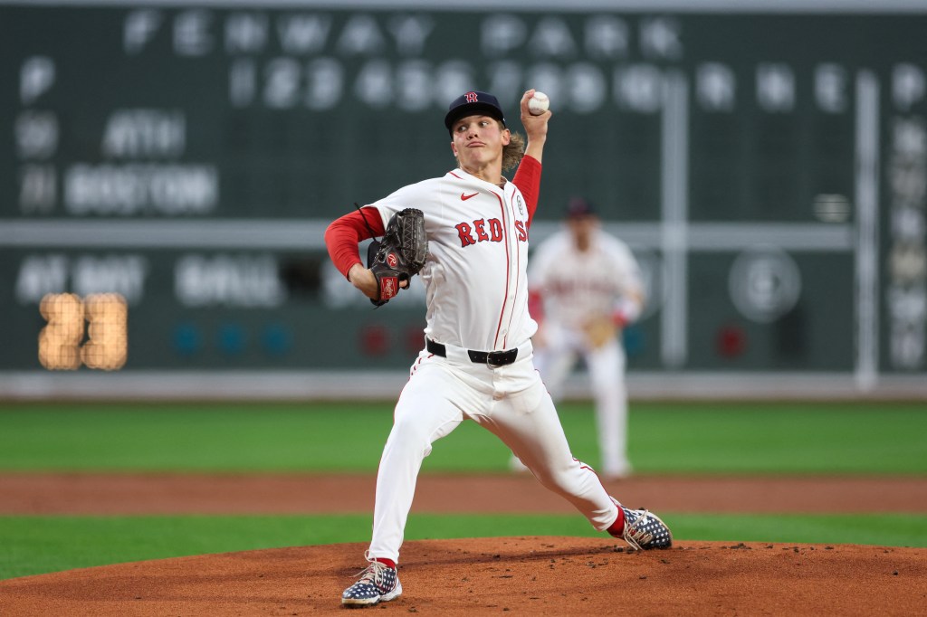 Boston Red Sox starting pitcher Connelly Early delivers a pitch against the Athletics at Fenway Park.