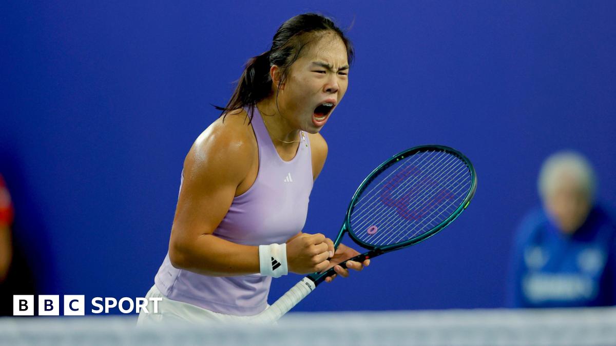 Mimi Xu celebrates after winning a point