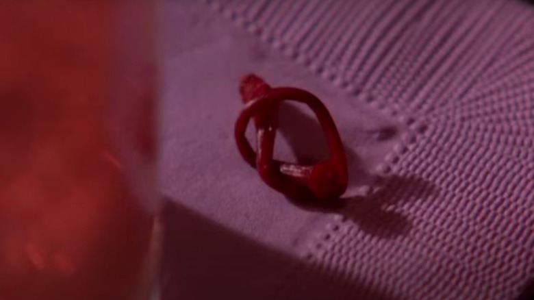 A cherry stem tied to a knot on the table on Twin Peaks
