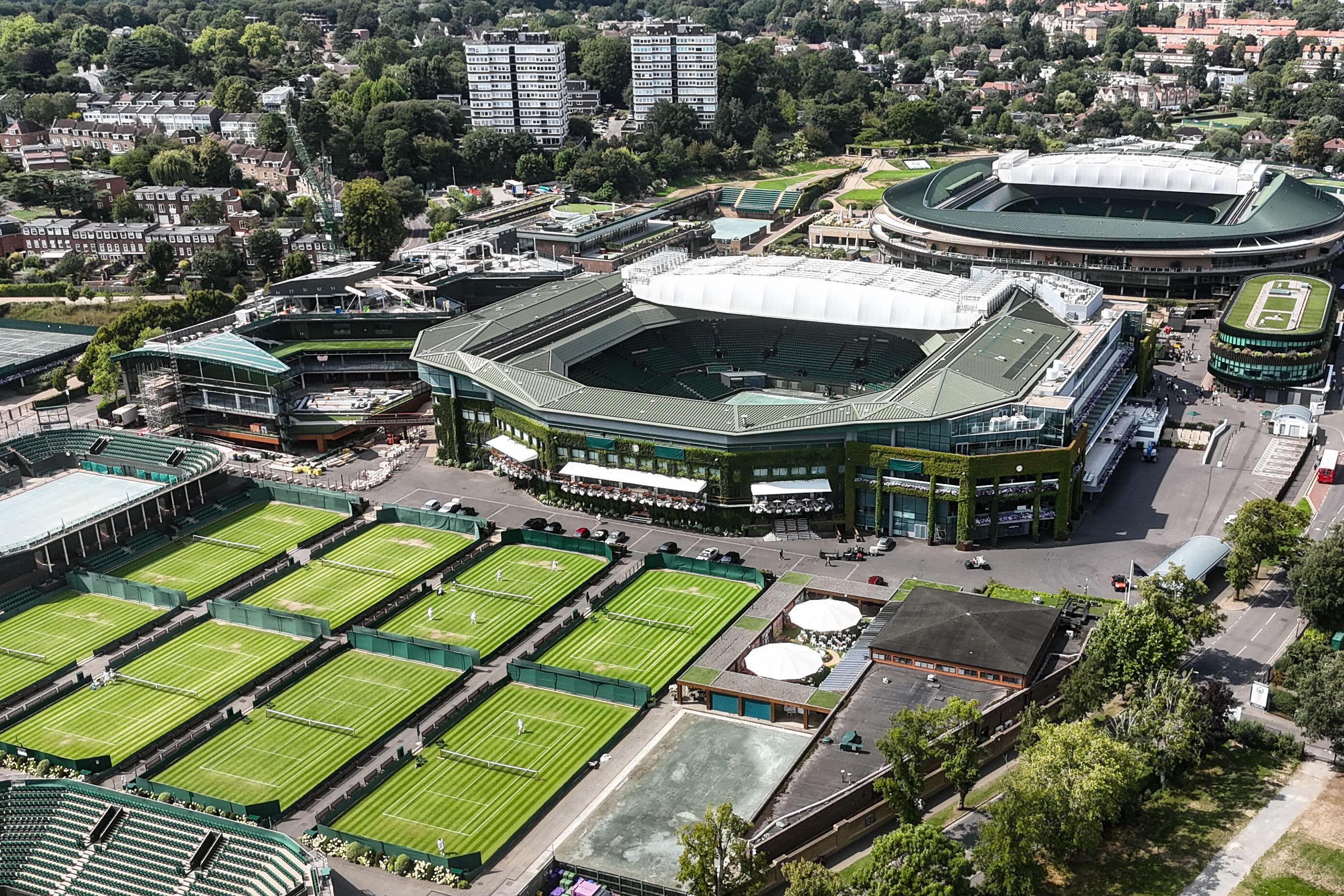Aerial view of the Wimbledon tennis courts and Centre Court with surrounding London.