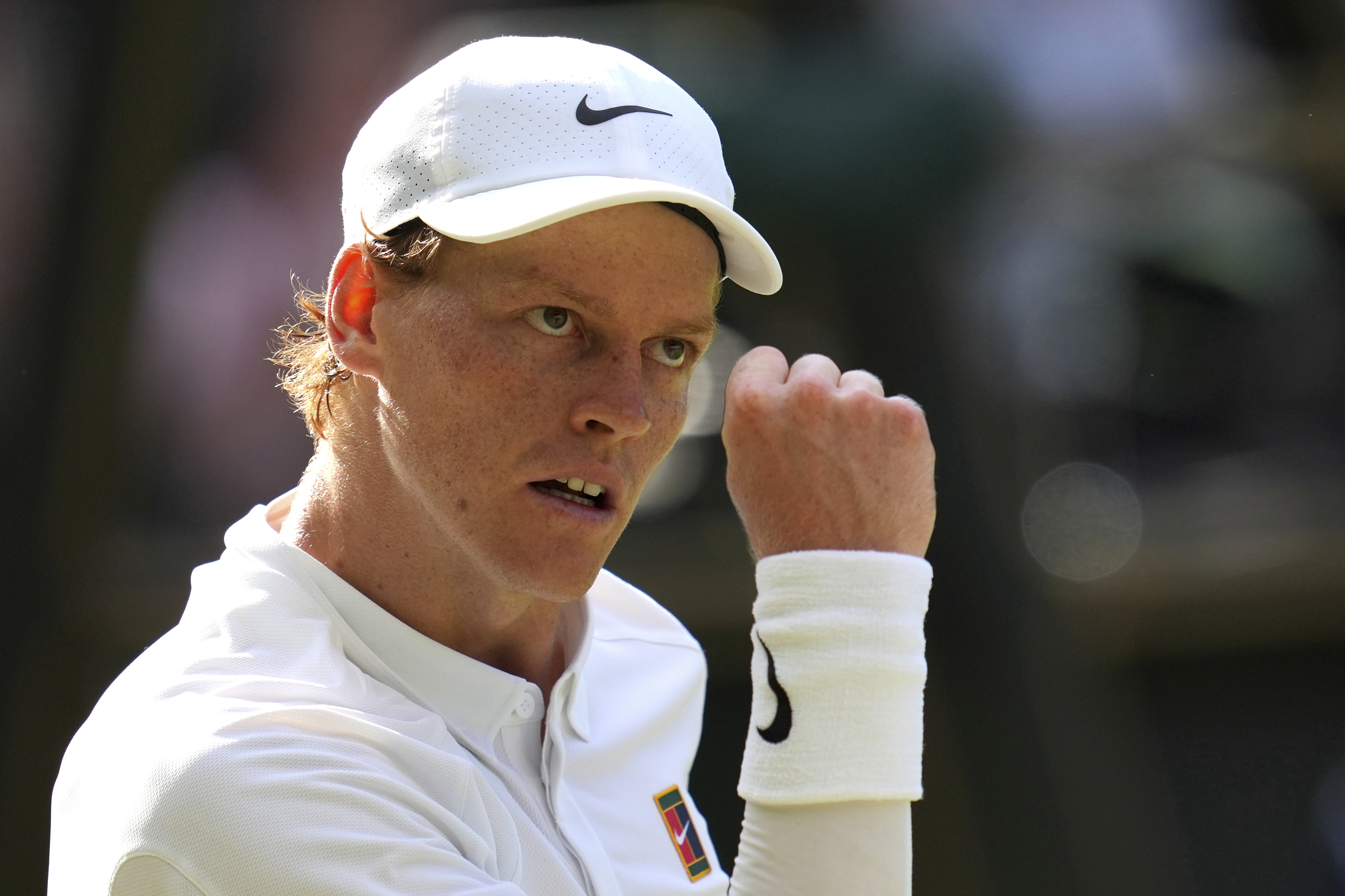 Jannik Sinner reacts after winning a point in the men's singles final at Wimbledon.