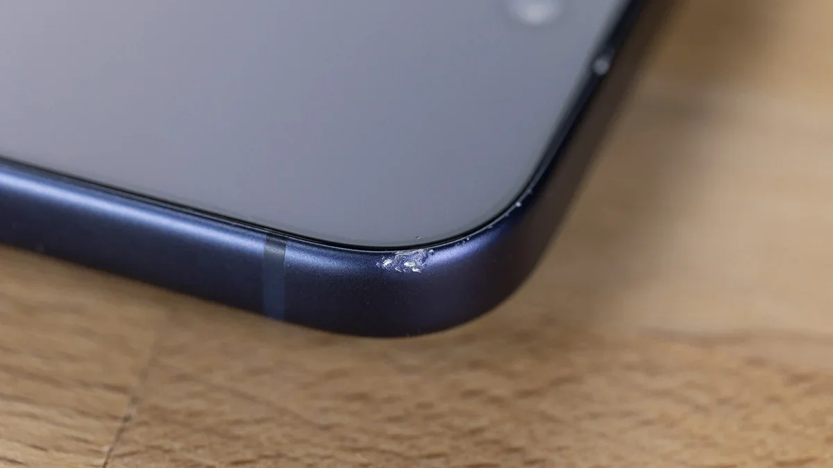 Close-up of an iPhone dent.
