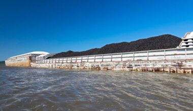 A barge transporting coal moves along the Illinois River near Peoria, Ill. Credit: Jim West/UCG/Universal Images Group via Getty Images
