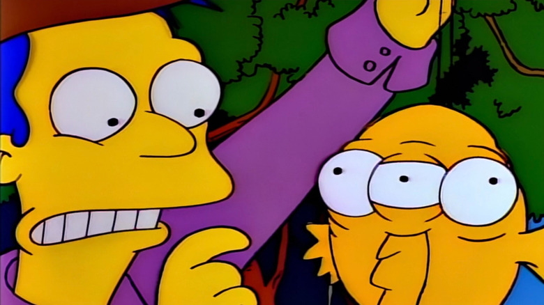 Reporter holding up Blinky on The Simpsons