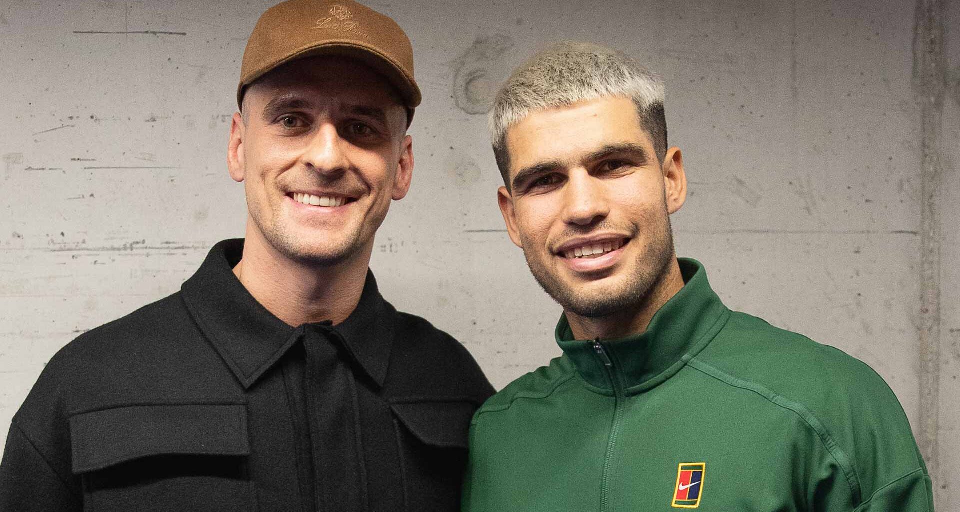 Arkadiusz Milik meets Carlos Alcaraz following the Spaniard's opening victory at the Nitto ATP Finals Sunday.