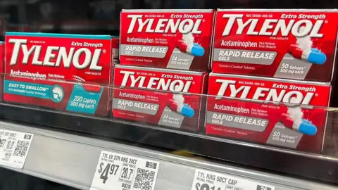 AFP via Getty Images Red boxes of Tylenol caplets are seen in a pharmacy in Houston, Texas, on September 23, 2025.