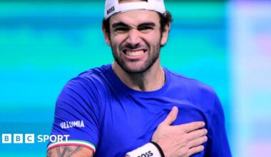 Matteo Berrettini celebrates winning his semi-final match for Italy in the Davis Cup