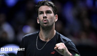 Cameron Norrie punches the air