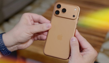 two hands holding a coffee ice cream-colored iPhone 17 Pro