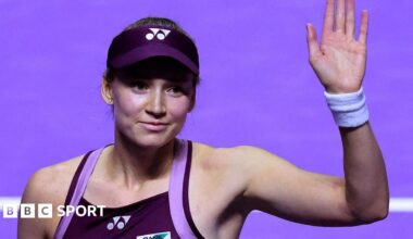 Elena Rybakina waves to the crowd at the WTA Finals