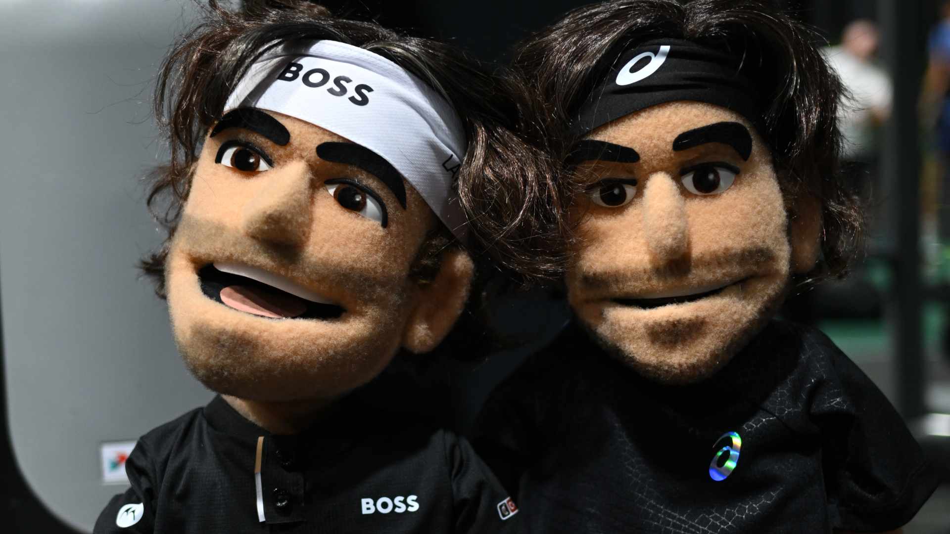 Taylor Fritz and Lorenzo Musetti's puppets roam the grounds in Paris. 