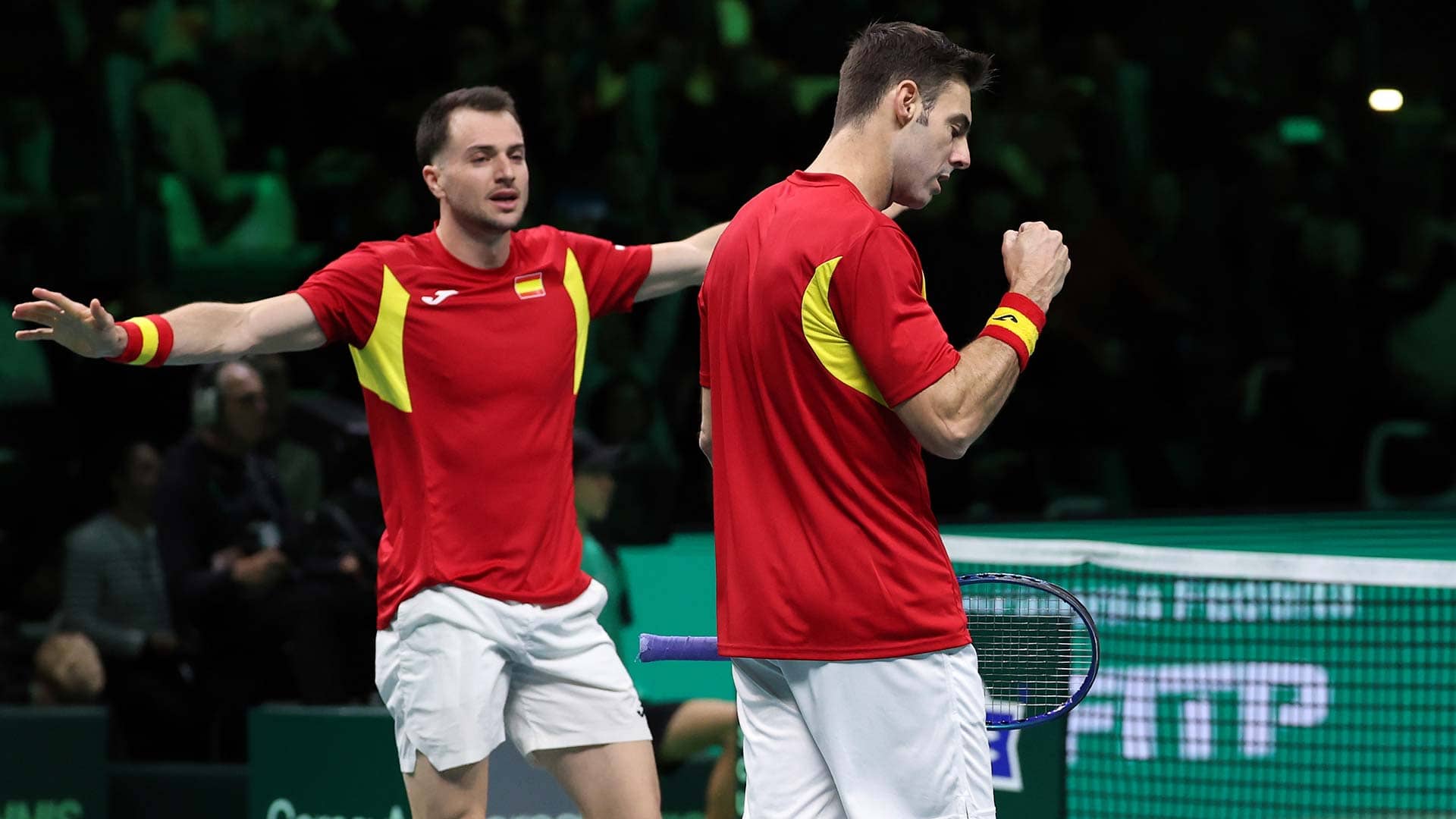 Spain's Pedro Martinez and Marcel Granollers celebrate on Saturday in Bologna.