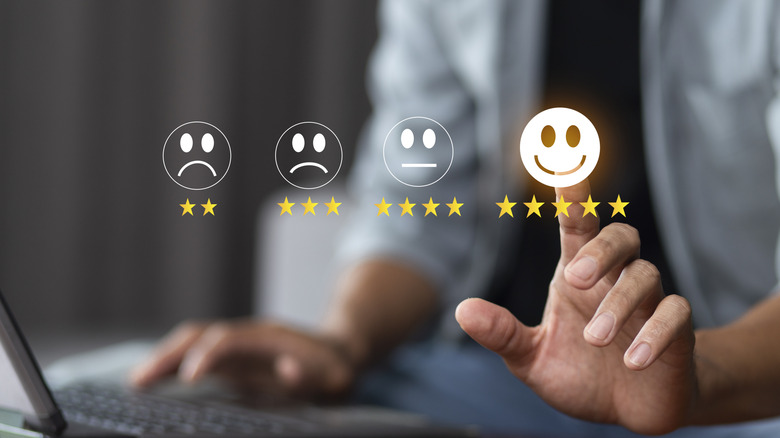 Customer touch feedback with happy smile icon