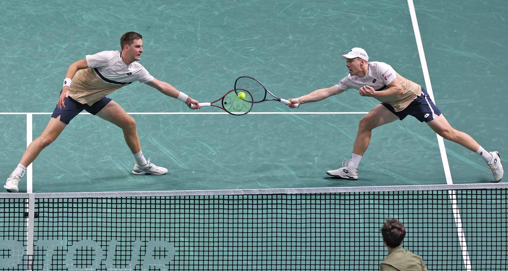 Henry Patten and Harri Heliovaara in action on Saturday during their Rolex Paris Masters semi-final win.
