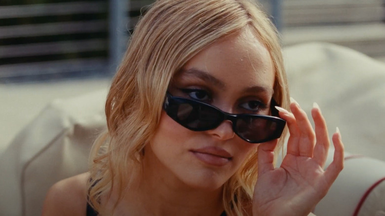 Jocelyn (Lily-Rose Depp) lowers her shades in The Idol