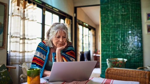 senior woman using laptop