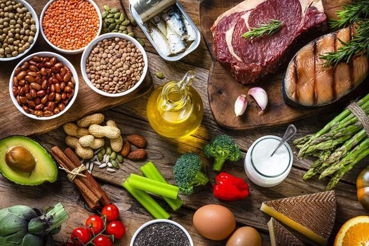 Fresh healthy organic food for balanced diet on wooden table