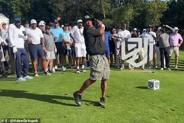 Ja Rule couldn't believe his eyes after he smashed the ball into the crowd at the tee box