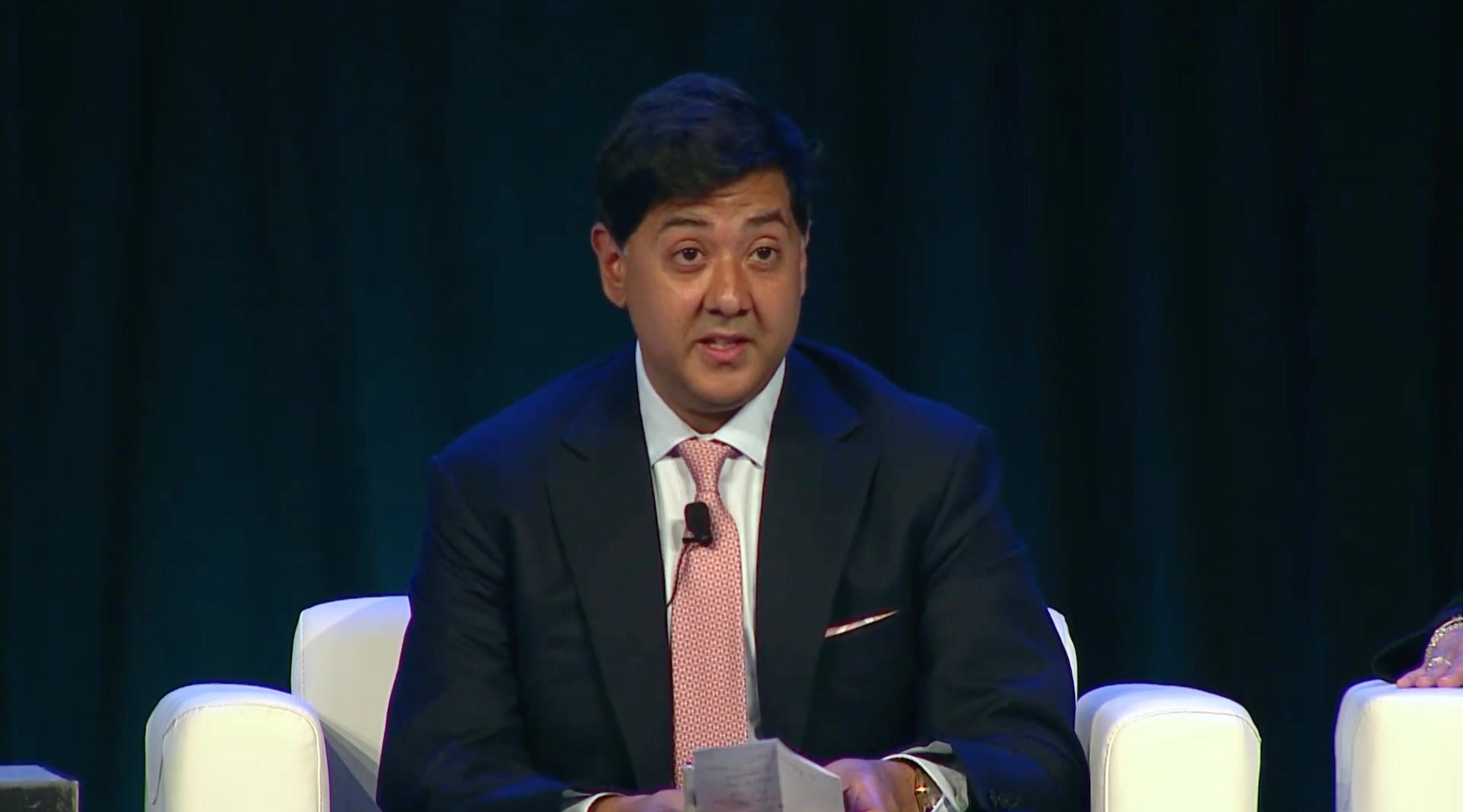 Imran Ahmed at a conference