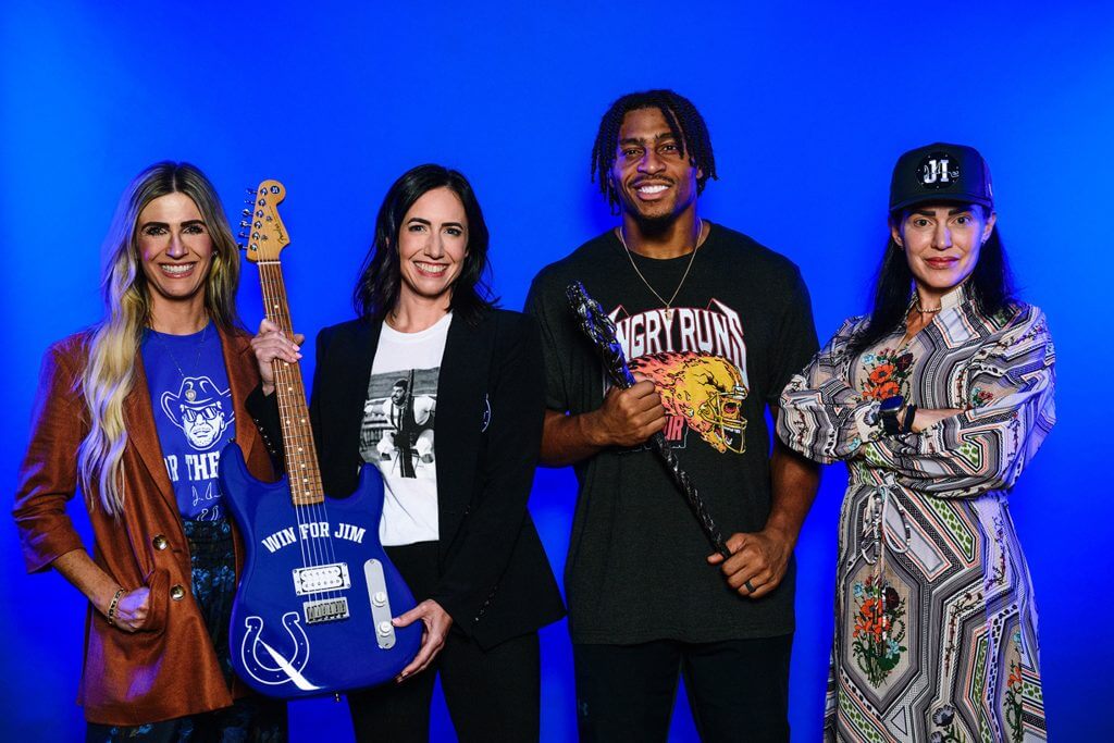 Sisters and owners of the Colts Casey Foyt, Kalen Jackson and Carlie Irsay-Gordon with Colts running back Jonathan Taylor.