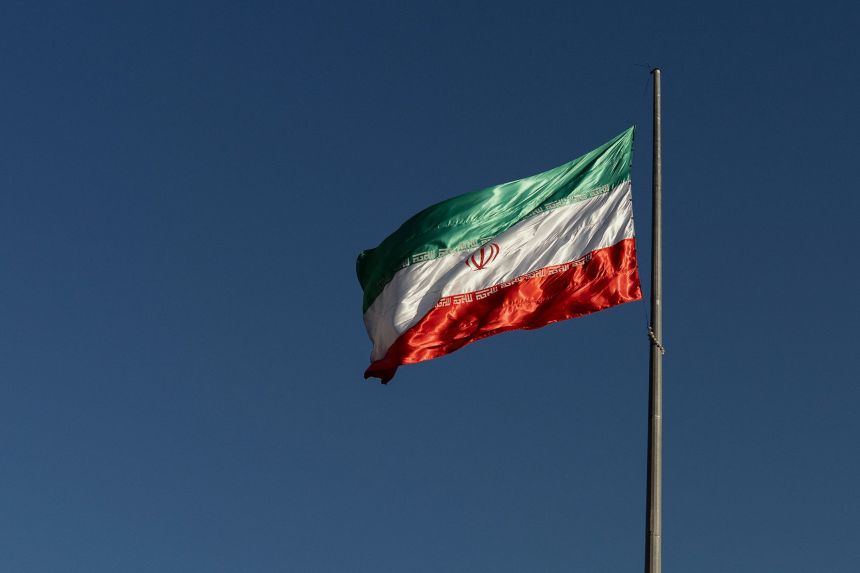 The Iranian national flag flies atop a pole at Bam-e Tehran in Tehran, Iran on October 24.