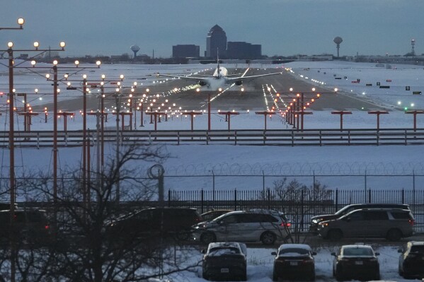 An American Airlines plane arrives at the O'Hare International Airport in Chicago, Sunday, Nov. 30, 2025. (AP Photo/Nam Y. Huh, File)