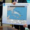 President Trump references a map while talking to reporters about Hurricane Dorian on Sept. 4, 2019. The map appears to have been altered by a black marker to extend the hurricane's range to include Alabama.