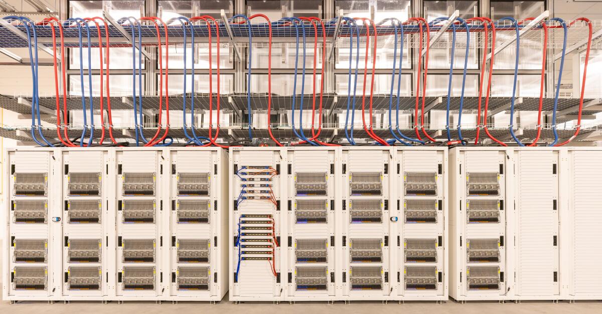 Rows of cables inside a data center.