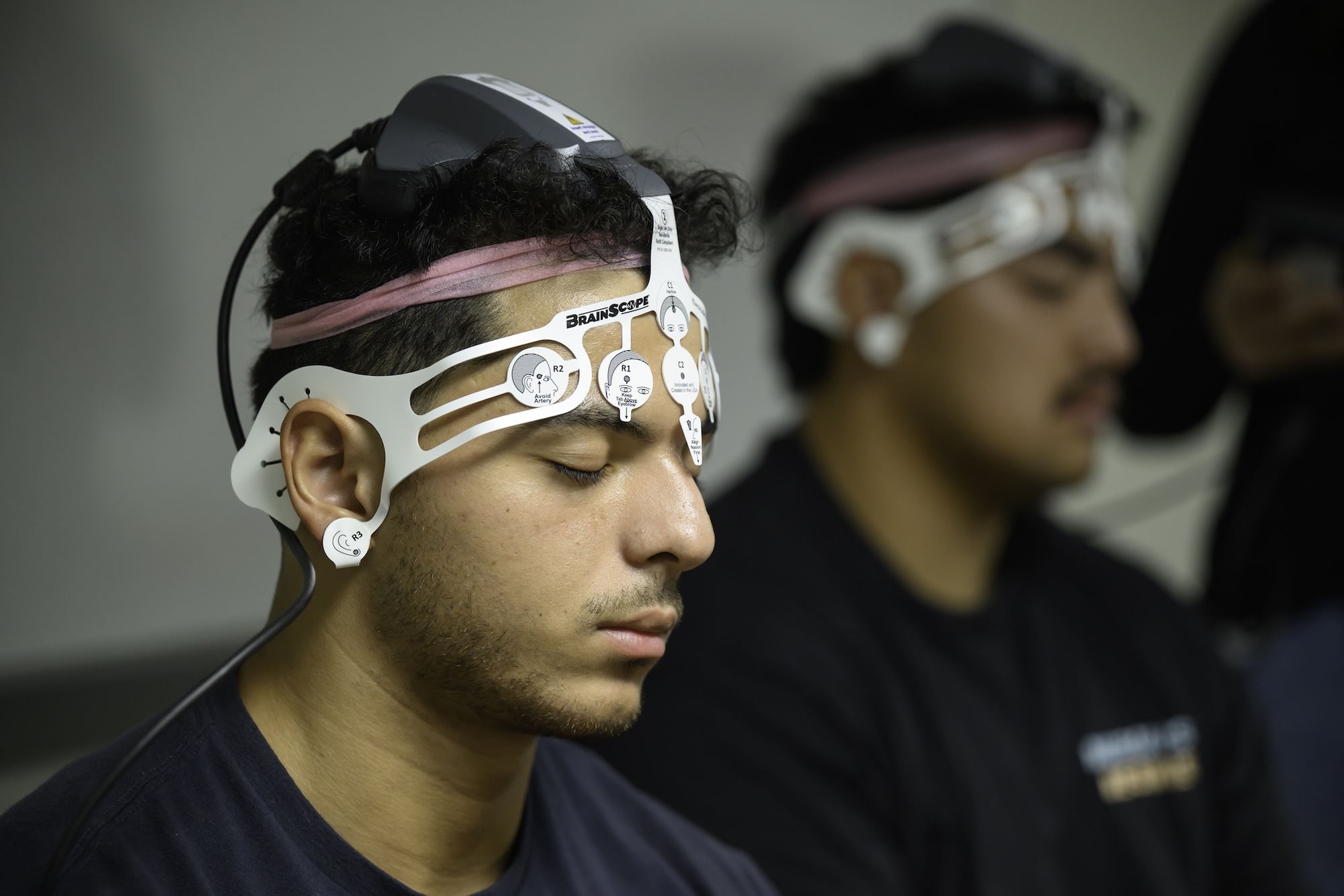Daniel Santos ’26 (L) and Lucas Villanueva ’26 undergo an EEG (Electroencephalogram).