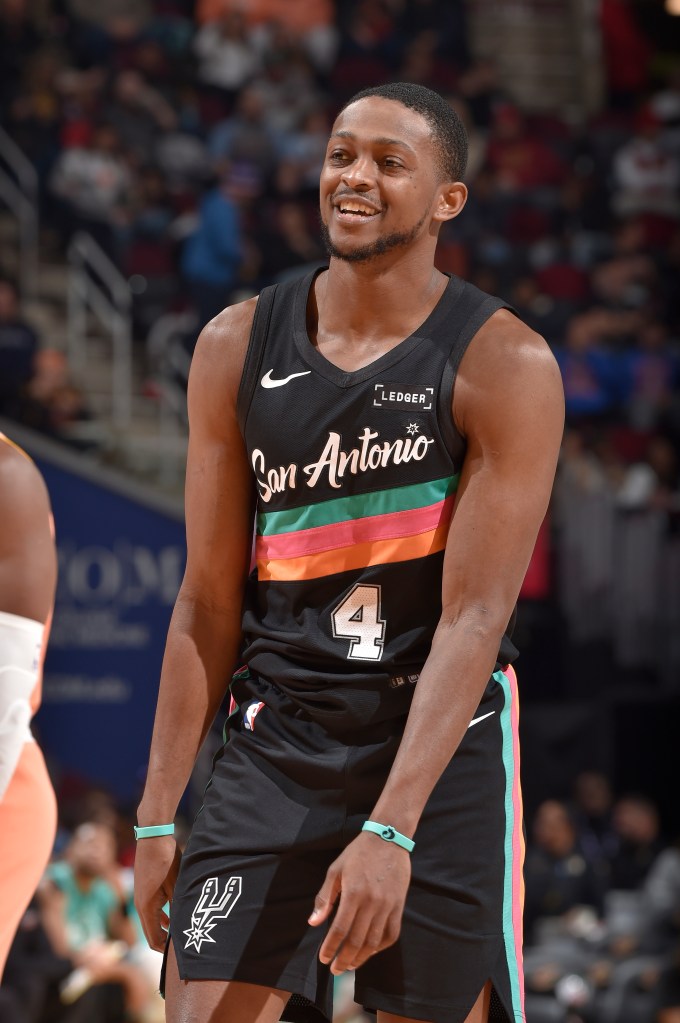 De'Aaron Fox smiles on the court