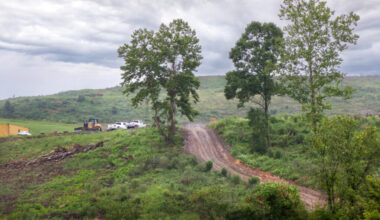 A view of the Westmoreland Sanitary Landfill in Belle Vernon, visible from a strip mall parking lot. Credit: Scott Goldsmith/Inside Climate News