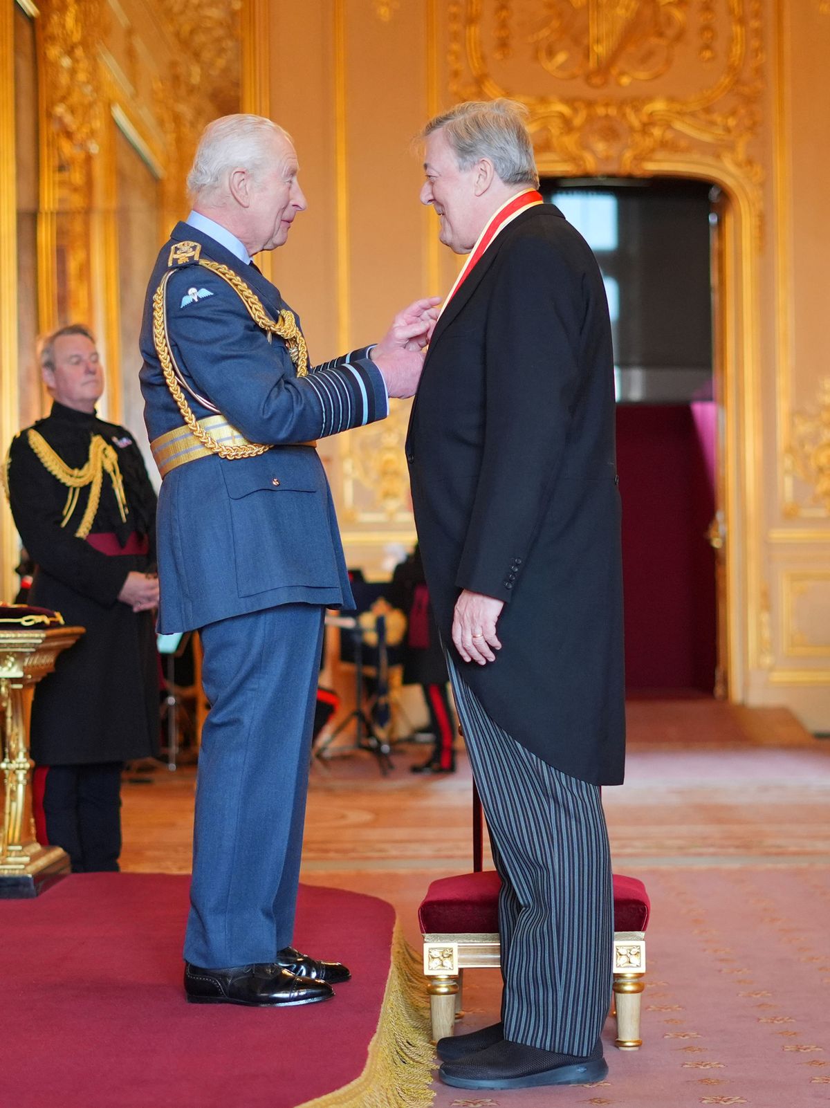 Sir Stephen is made a Knight Bachelor by King Charles III at Windsor Castle. 