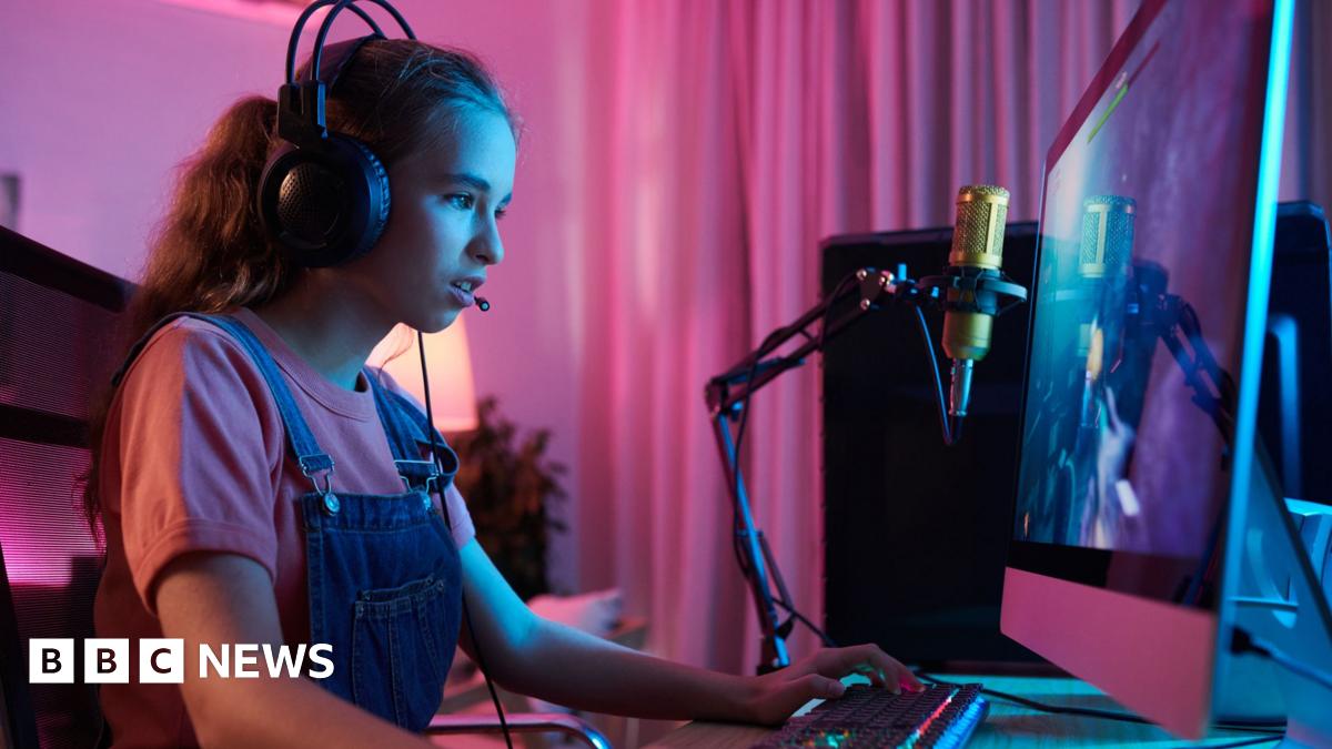 Concentrated teenage girl gaming