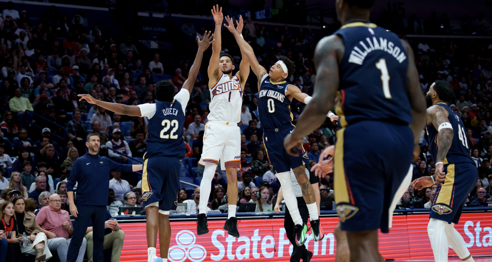 Booker leads Suns past Pelicans 123-114 after Alvarado and Williams exchange punches in testy game