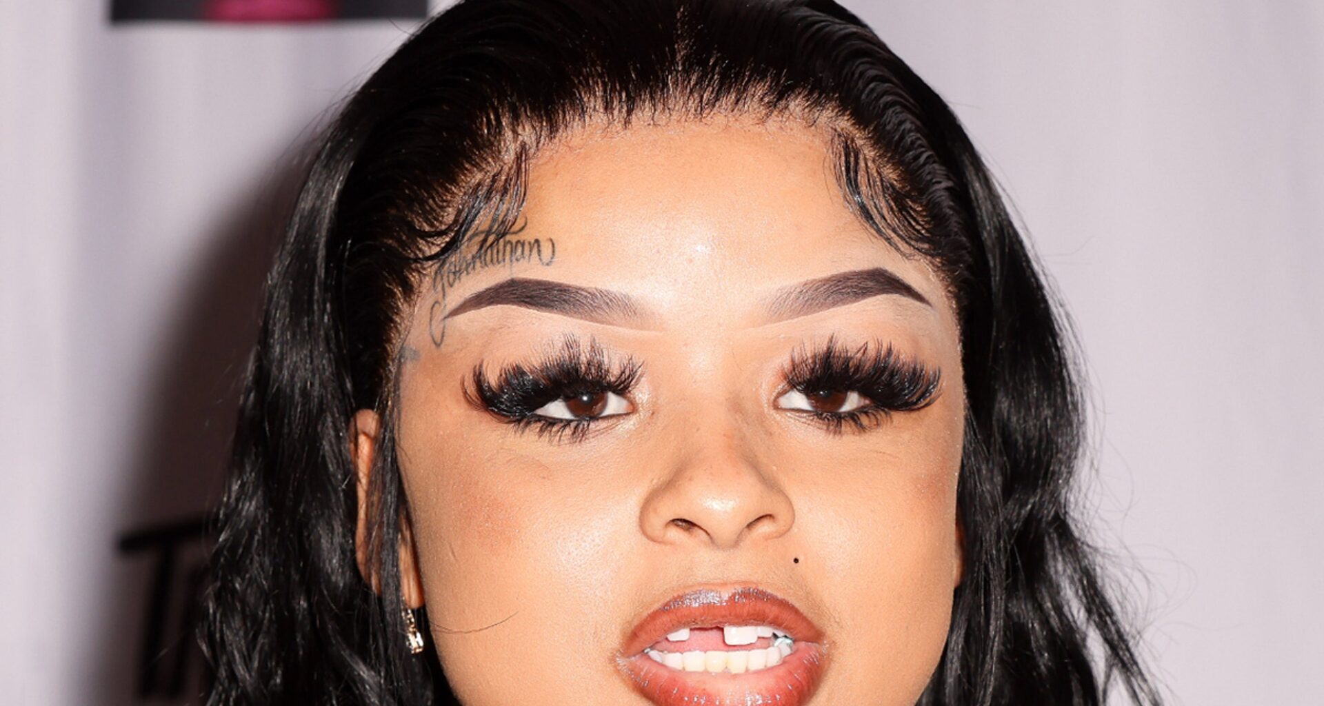 Chrisean Rock Slapped After Reaching For Fan's Phone, Video Shows