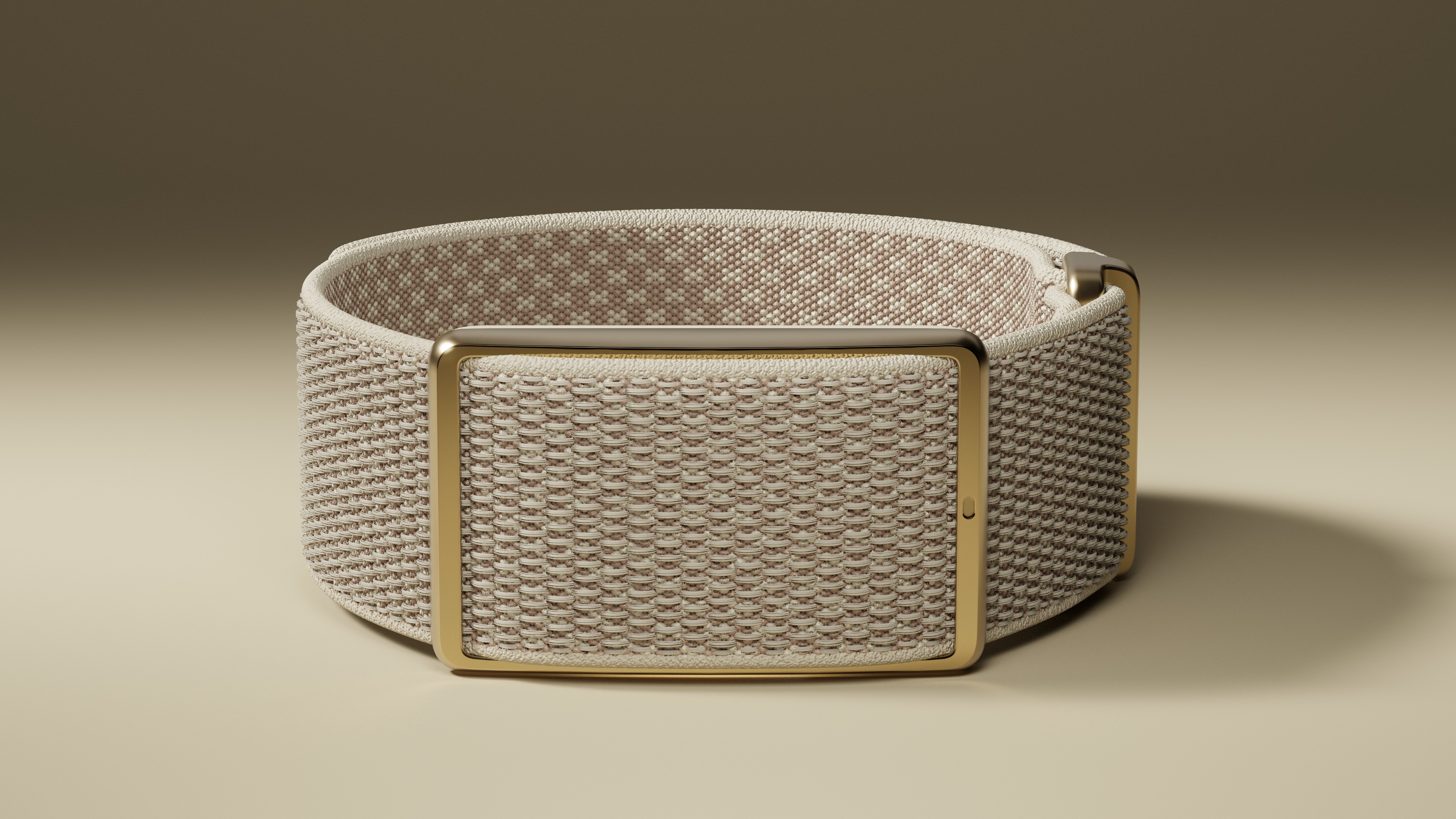 Press photo of the beige Polar Loop screenless wristband sitting on a well-lit white surface.