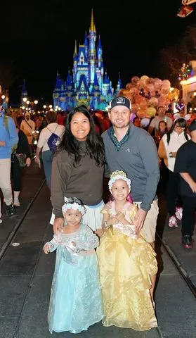 Simmy Larkin Simmy, her husband, and two daughters