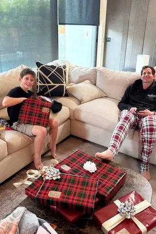 Heather Rae El Moussa/Instagram Brayden unwraps gifts from his father Tarek and stepmother Heather Rae El Moussa