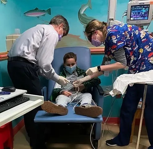 Goldsztein Family / The Medulloblastoma Initiative Frederico Goldsztein (sitting in chair) was diagnosed with medulloblastoma in 2015