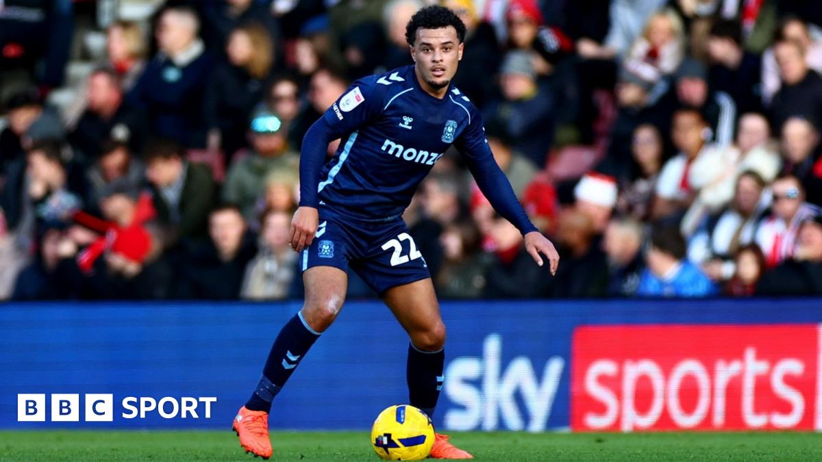 Coventry City crest on a corner flag