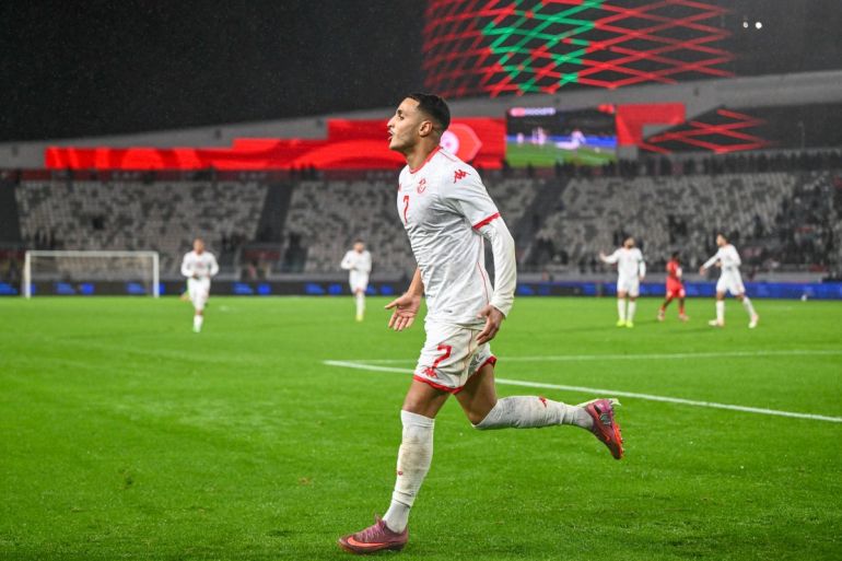 Tunisia's forward #07 Elias Achouri celebrates his goal during the Africa Cup of Nations (CAN) Group C football match between Tunisia and Uganda