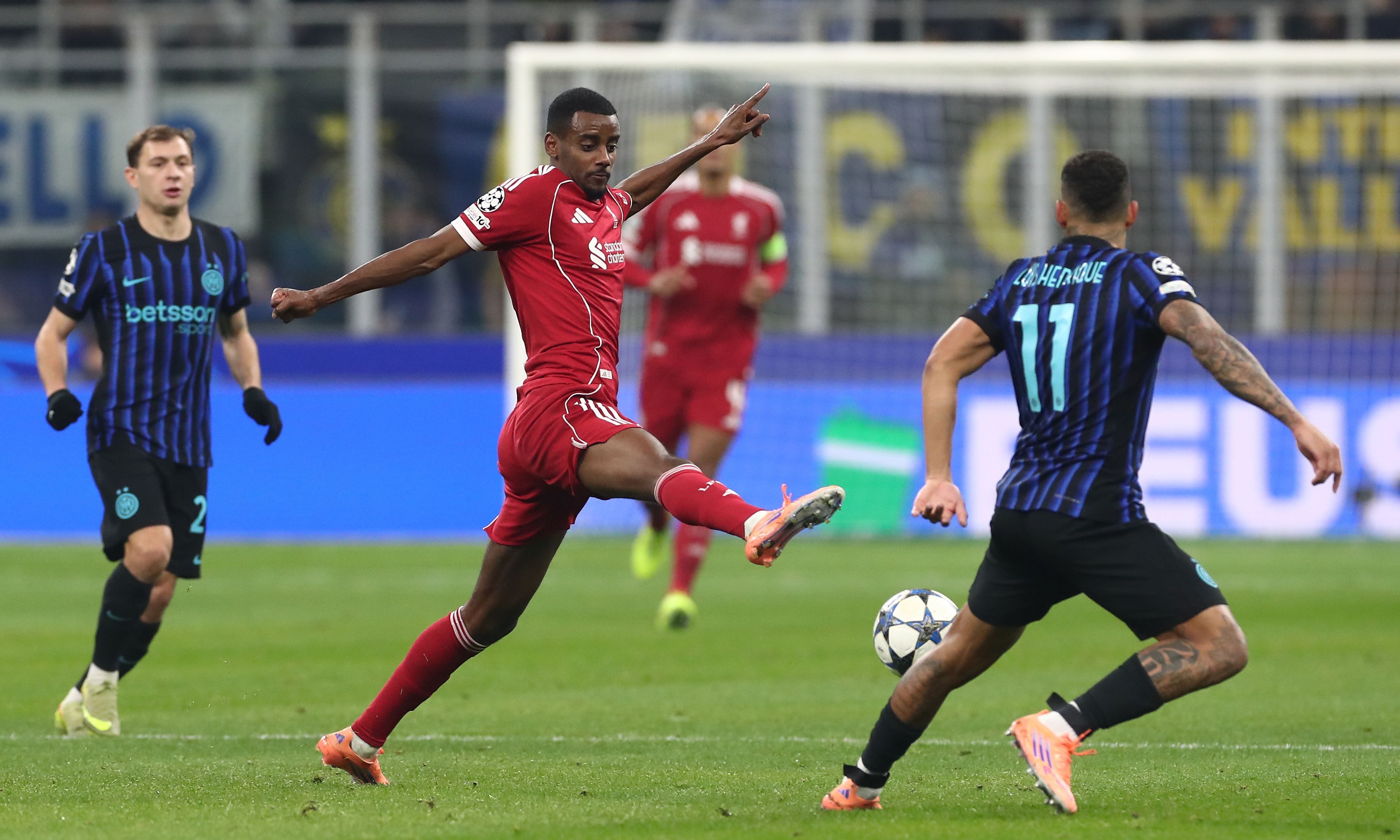 Alexander Isak lunges for the ball at the San Siro.