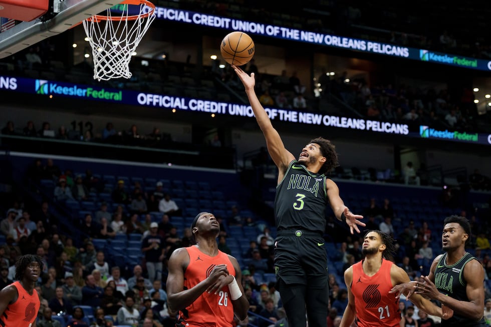New Orleans Pelicans guard Jordan Poole (3) shoots against Portland Trail Blazers center Duop...