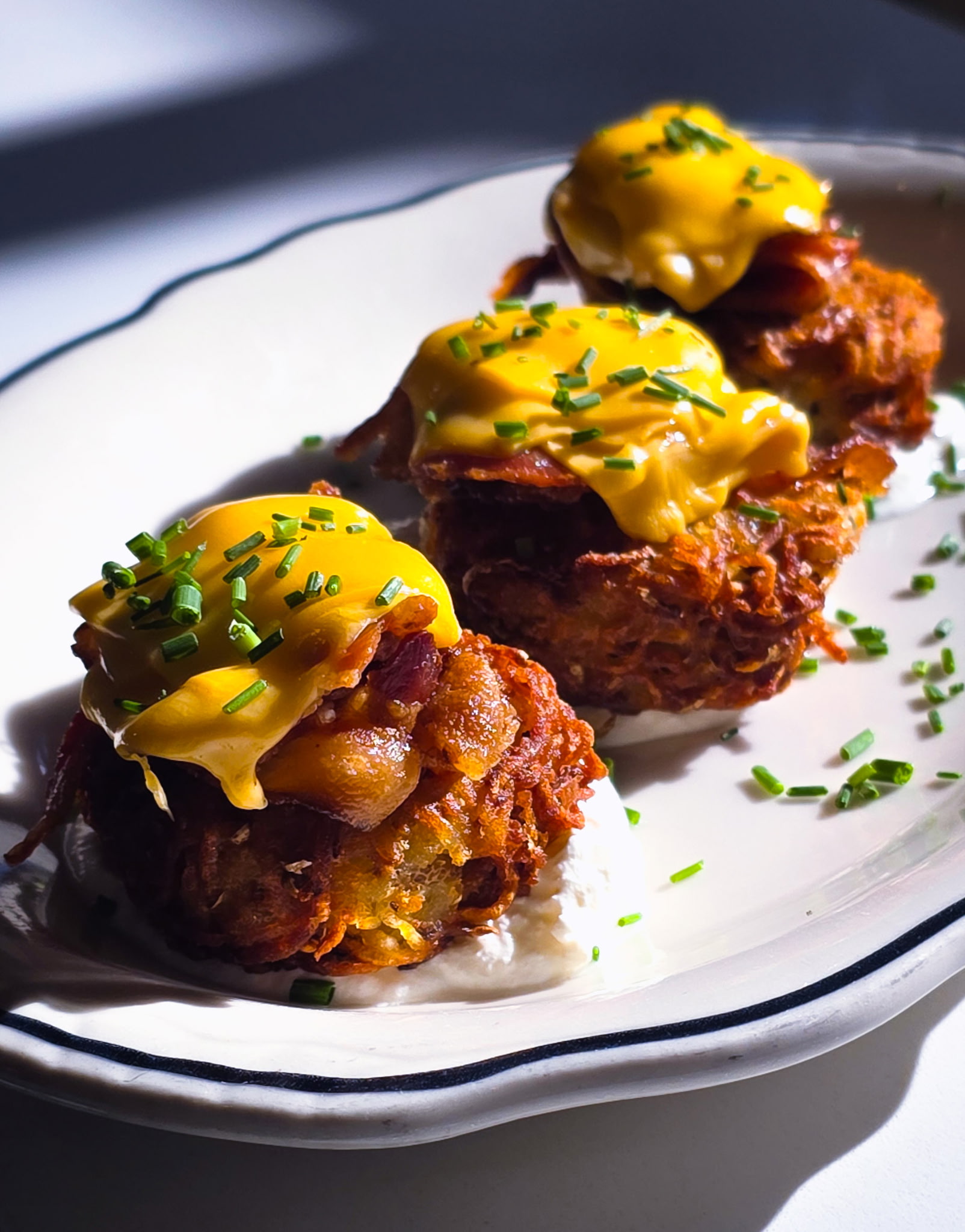 Latkes feature bacon, egg, and cheese at Buffalo & Bergen.