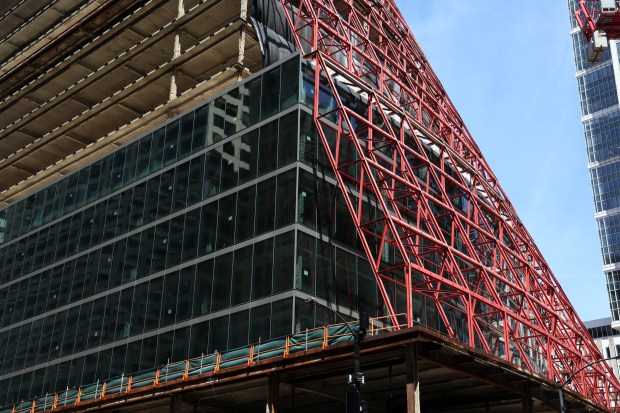 Glass is installed on part of the exterior of the Thompson Center building in Chicago as its redevelopment into office space for Google employees continues May 7, 2025. (Terrence Antonio James/Chicago Tribune)