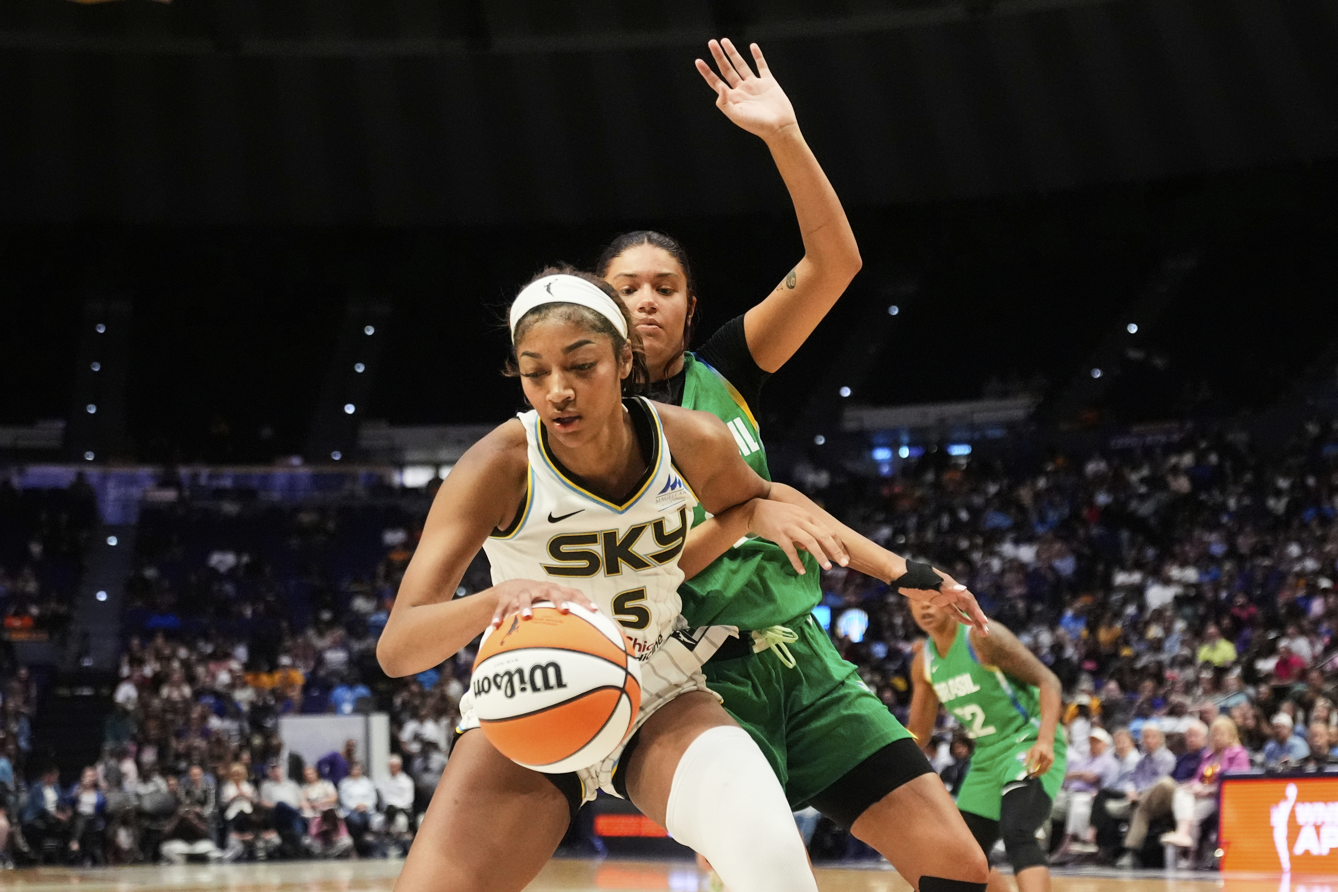 Brazil forward Manu Alves defends Sky forward Angel Reese in...