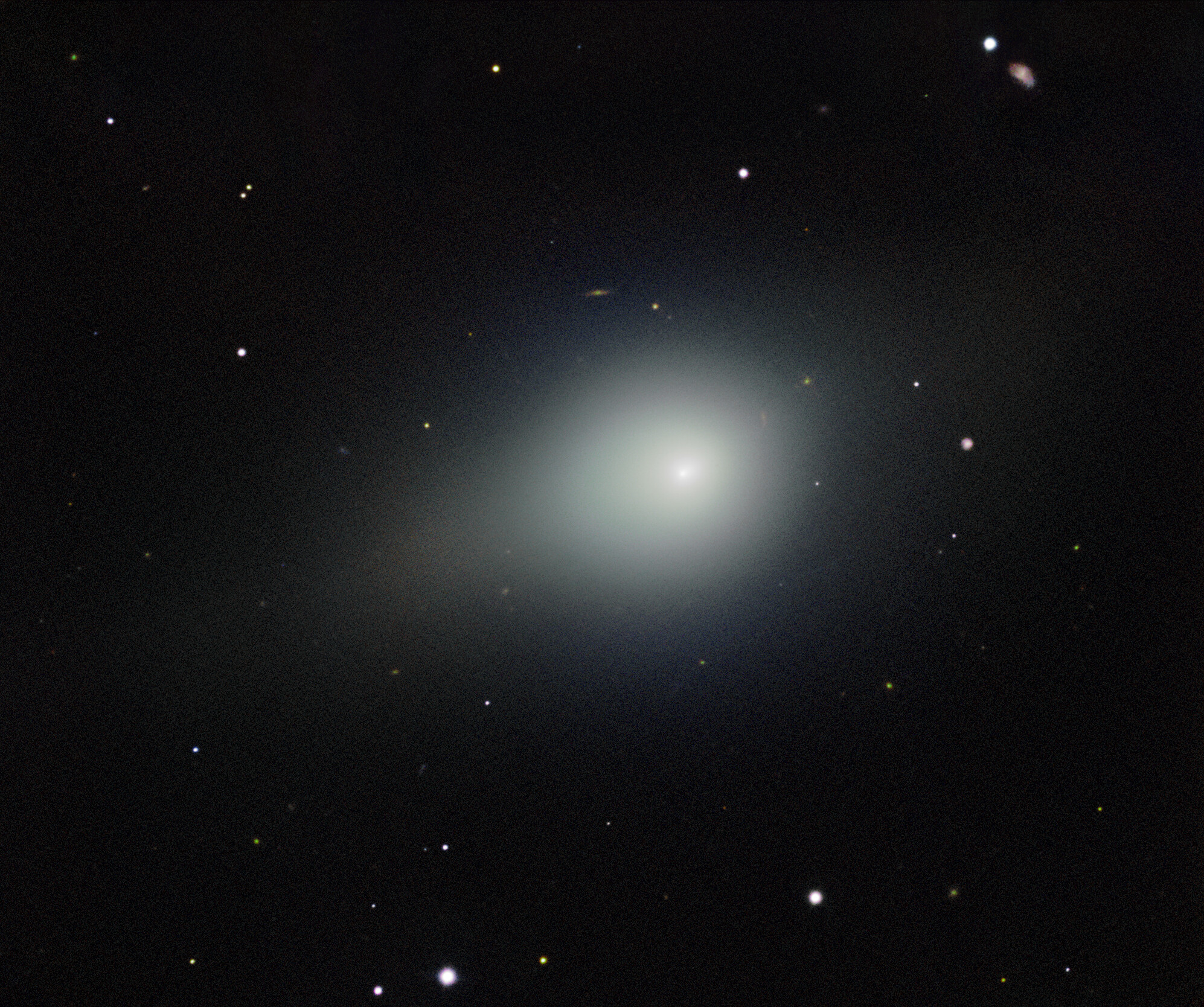 Comet 3I/ATLAS glowing in space