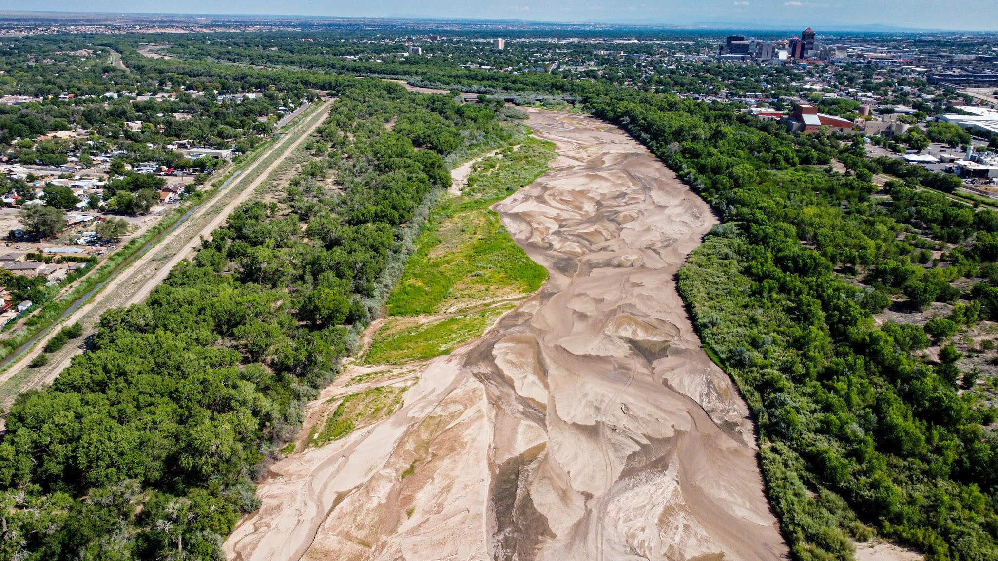 An aerial view of the Rio Grande in Albuquerque during a dry period in July 2022. Credit: Paul Tashjian