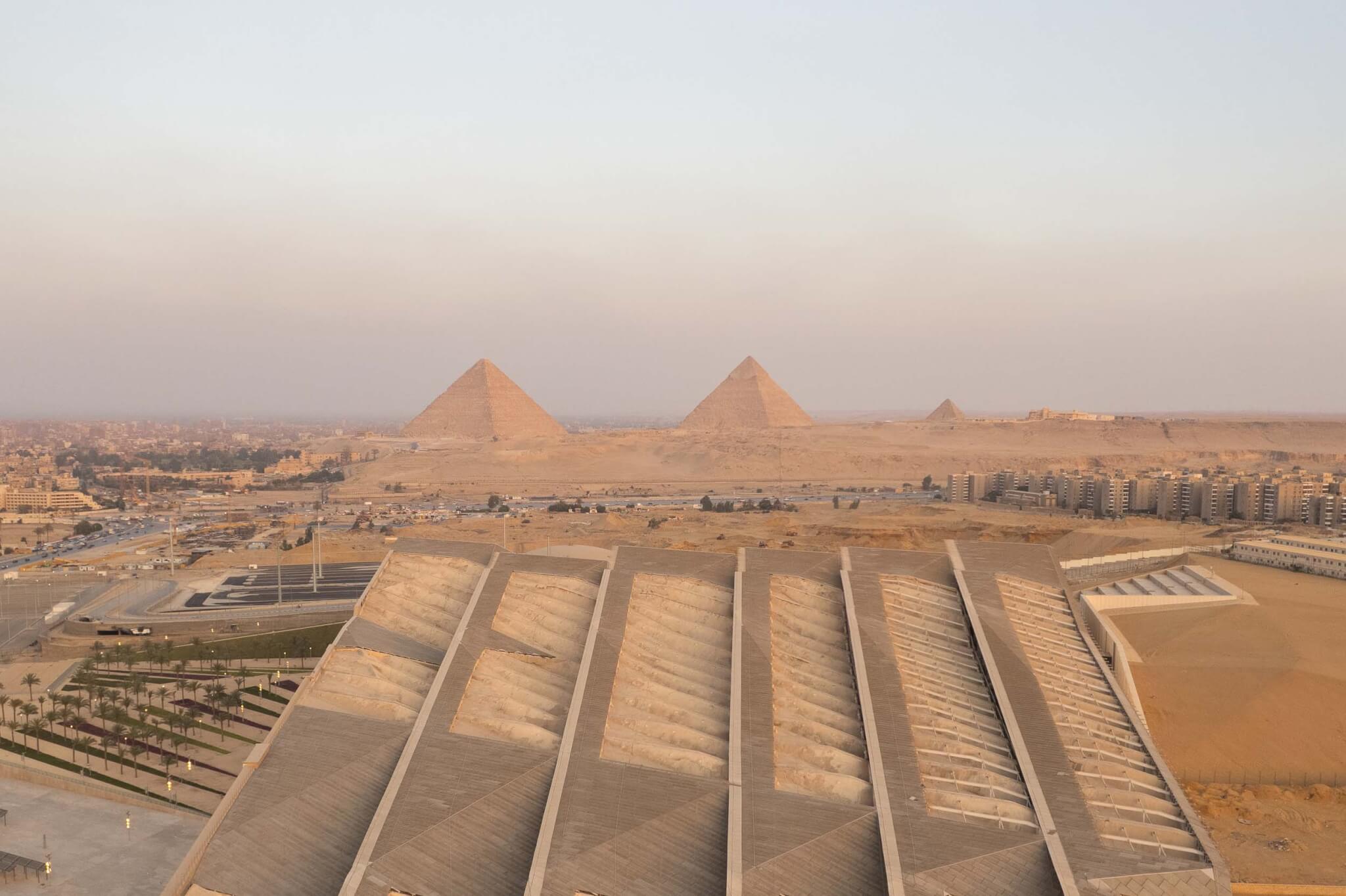 Grand Egyptian Museum and view of pyramids