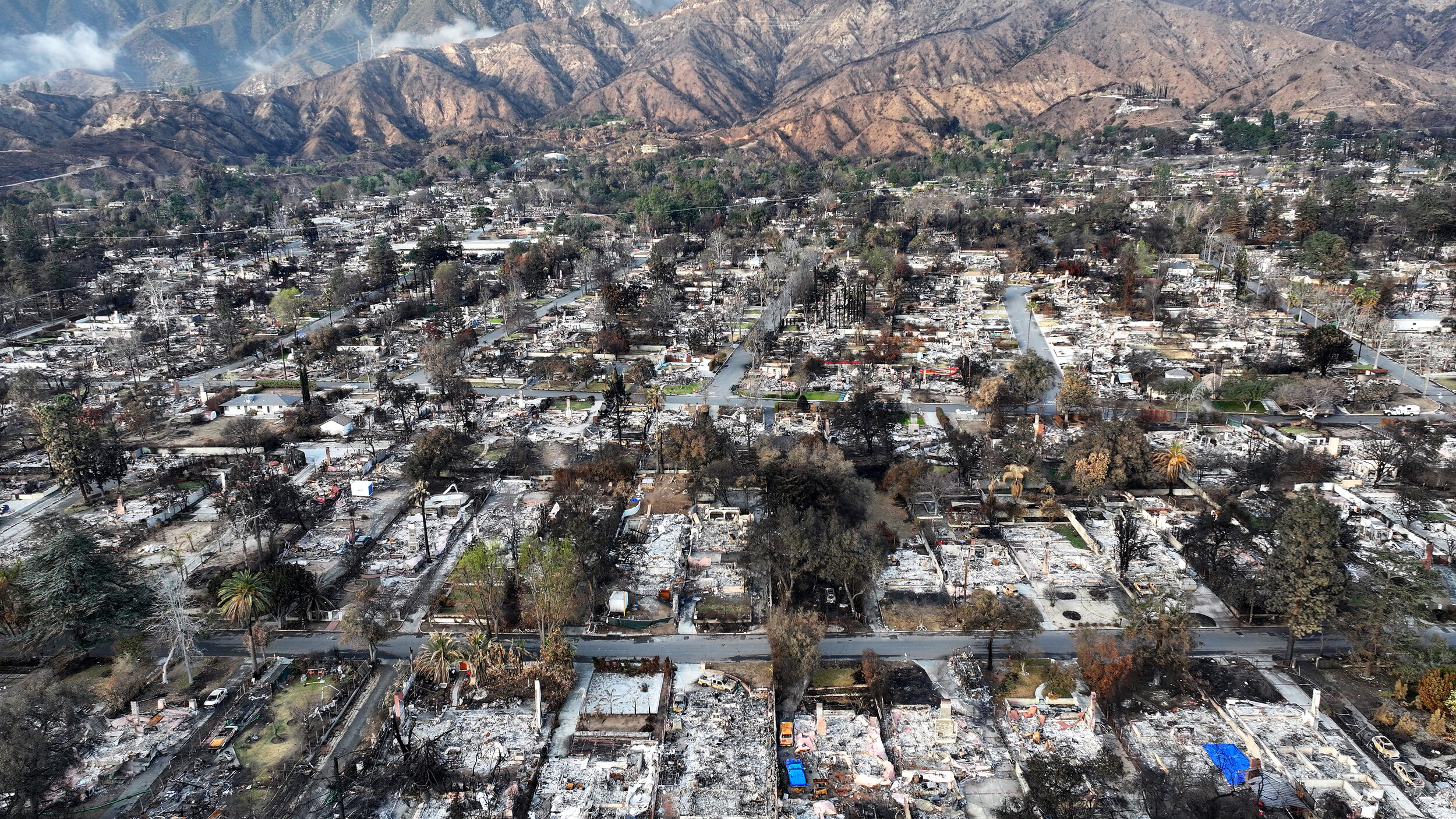 An aerial view shows homes burned in the Eaton Fire on Feb. 5 in Altadena, Calif. Credit: Mario Tama/Getty Images